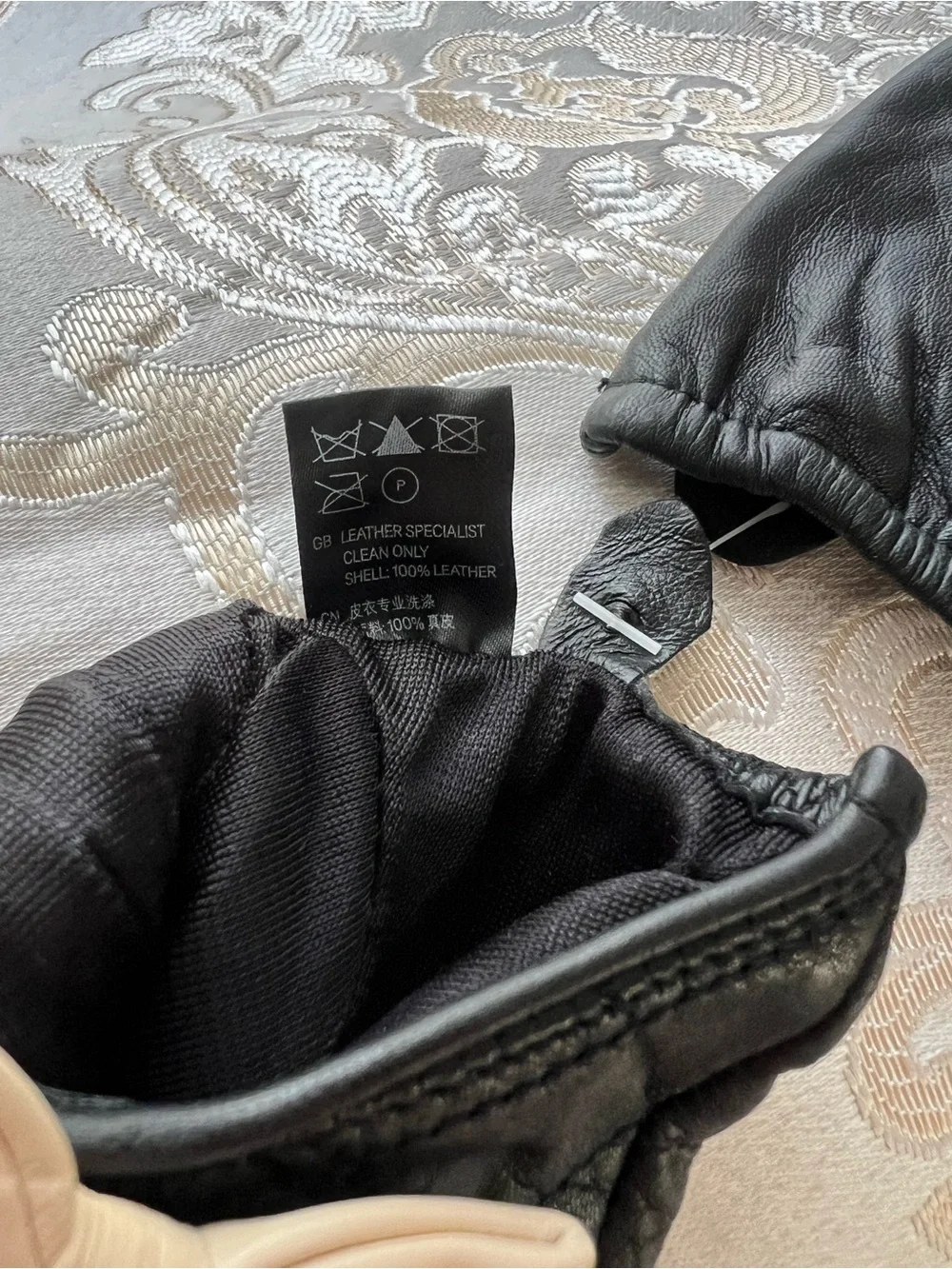 Black Quilted Leather Gloves with Beige Bow Accent